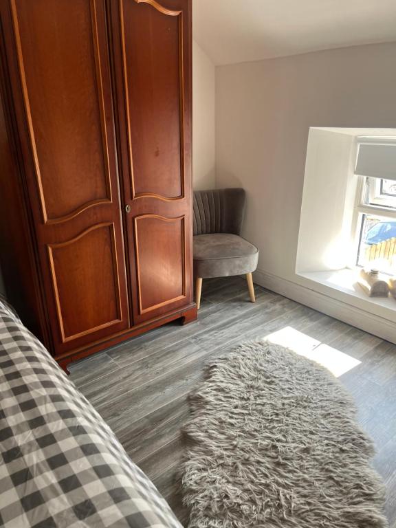 Postel nebo postele na pokoji v ubytování Pringle cottage