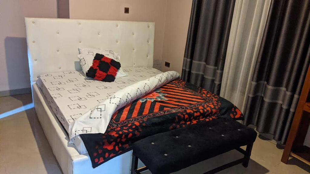 Кровать или кровати в номере Royal villas