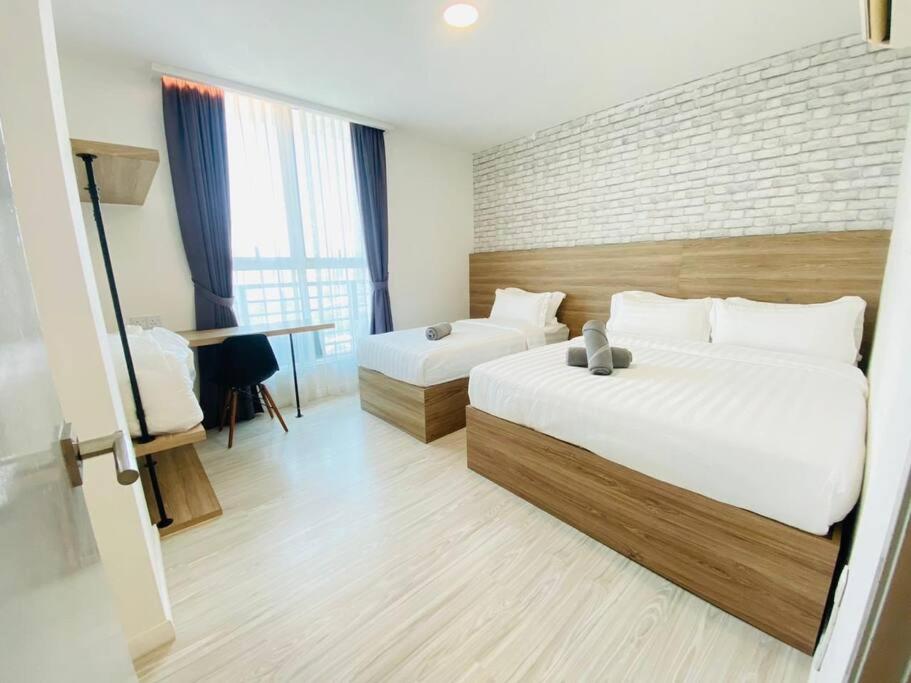 Katil atau katil-katil dalam bilik di Dual key unit 4bedroom 9Pax Sutera Avenue