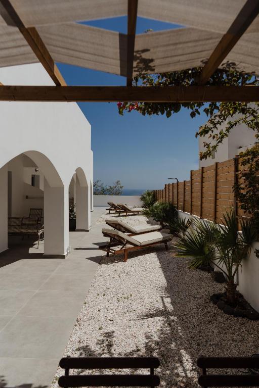 Fotografie z fotogalerie ubytování The Vine Suites v destinaci Vourvoúlos