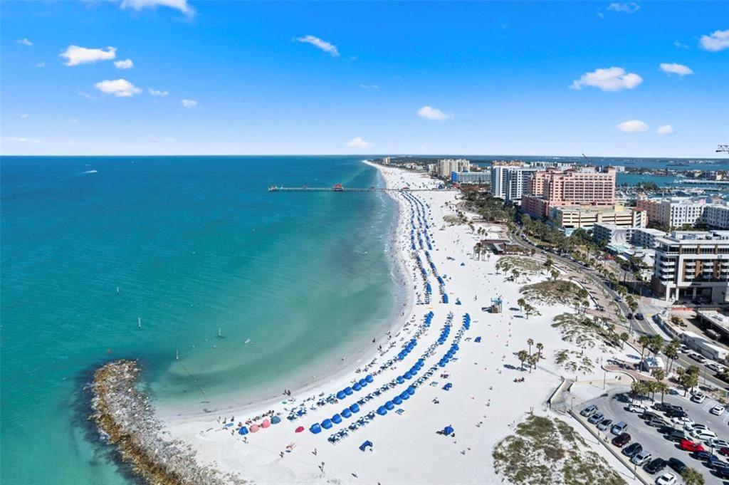 an aerial view of a beach with people and the ocean at Pelican Point on Clearwater Beach in Clearwater Beach