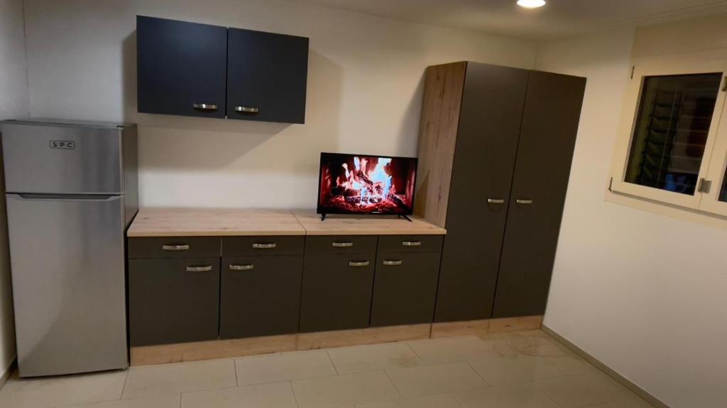 En TV eller et underholdningssystem på Triengen 1 Zimmer ohne Küche