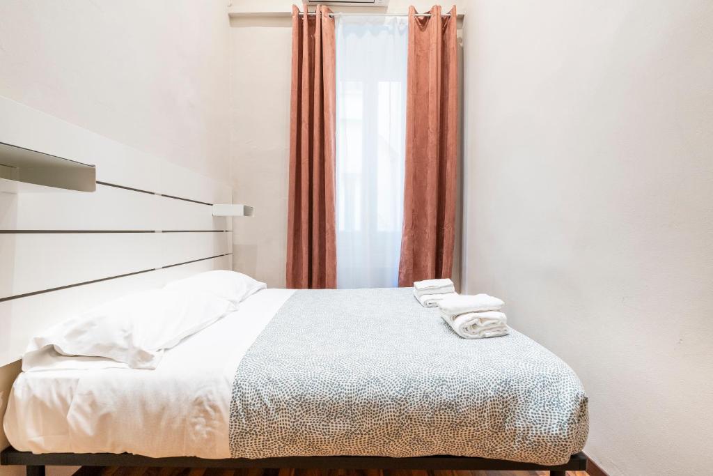 Posteľ alebo postele v izbe v ubytovaní Apartment Duomo