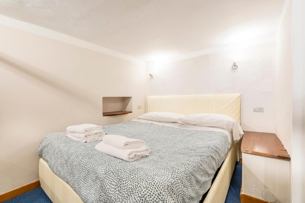Posteľ alebo postele v izbe v ubytovaní Apartment Duomo