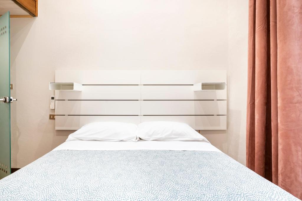 Posteľ alebo postele v izbe v ubytovaní Apartment Duomo
