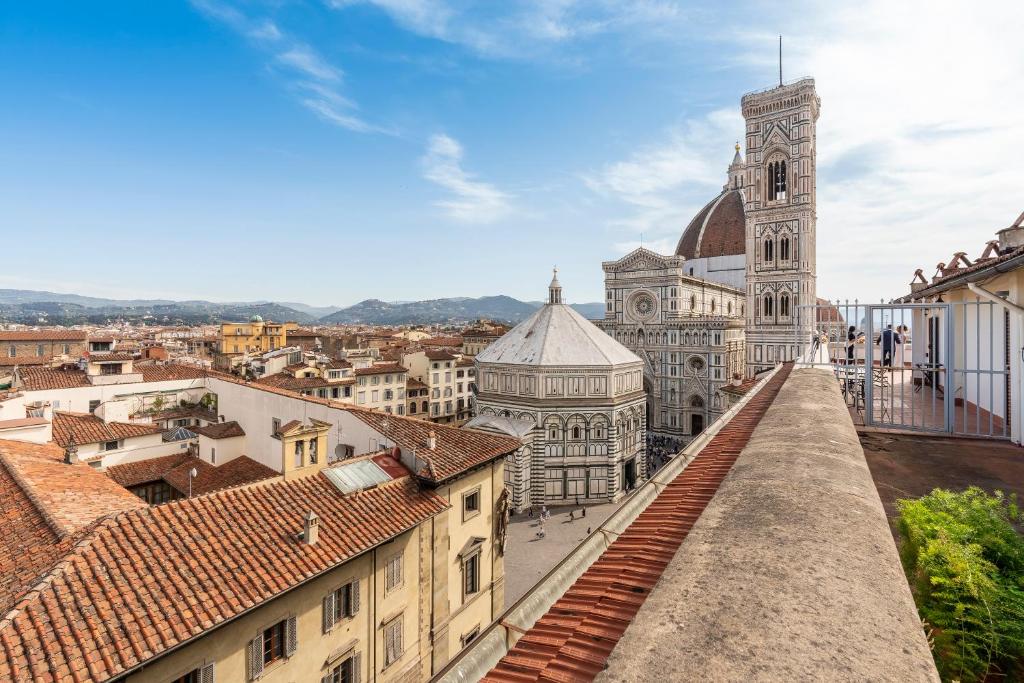 a view of a cathedral from the roof of a city at Apartment Duomo in Florence
