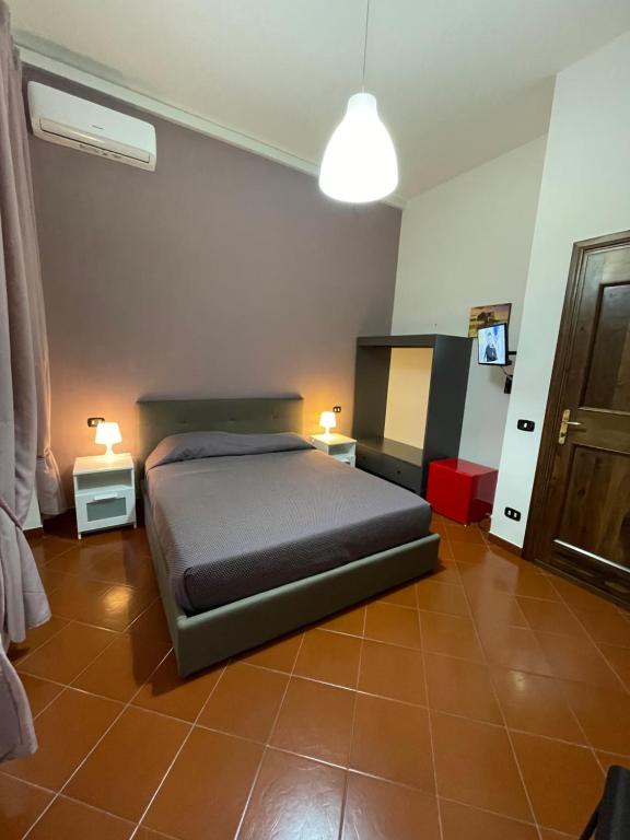 Posteľ alebo postele v izbe v ubytovaní Dante Rooms