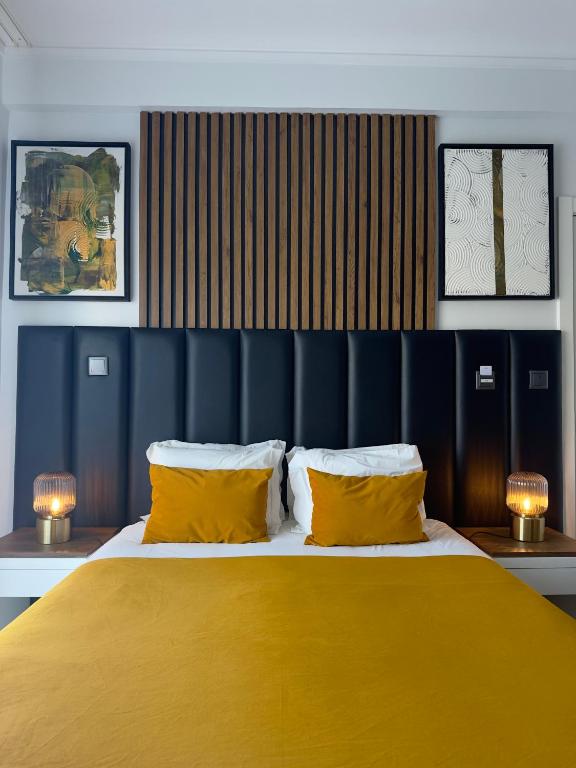 Postel nebo postele na pokoji v ubytování Hotel Don Rodrigues
