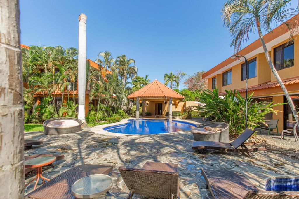 Bazén v ubytování Green Villas El Coco nebo v jeho okolí