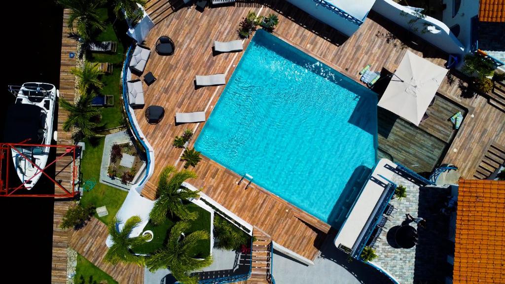 an overhead view of a large swimming pool at Habitat Village in Higuerote
