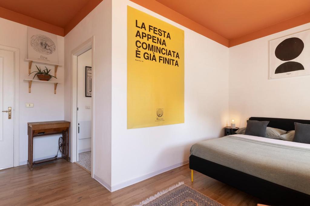 Posteľ alebo postele v izbe v ubytovaní HOMESTAY rooftop