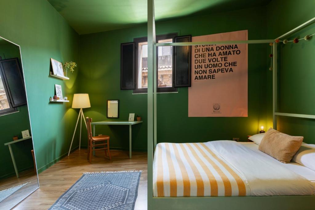 Posteľ alebo postele v izbe v ubytovaní HOMESTAY rooftop