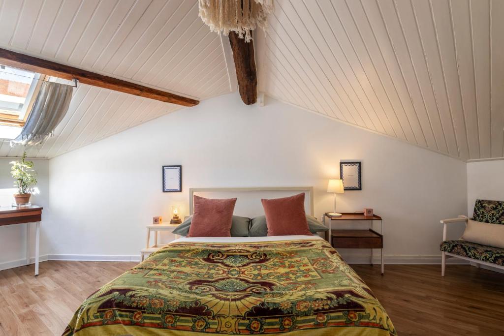 Posteľ alebo postele v izbe v ubytovaní HOMESTAY rooftop
