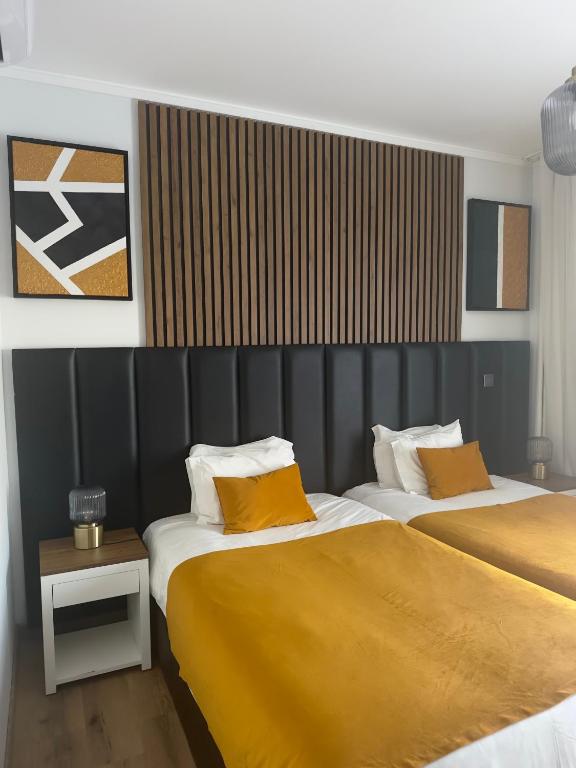 Postel nebo postele na pokoji v ubytování Hotel Don Rodrigues
