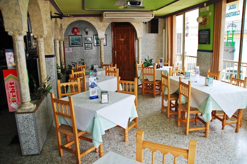 Reštaurácia alebo iné gastronomické zariadenie v ubytovaní Hostal Mary Tere