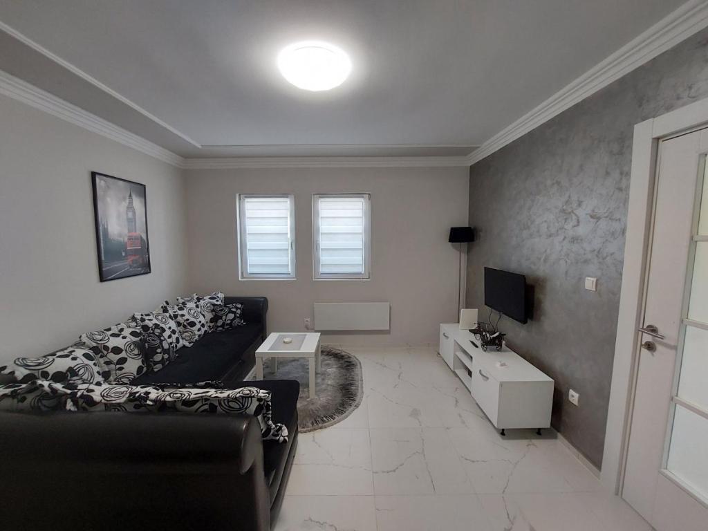 TV a/nebo společenská místnost v ubytování D&N Apartman