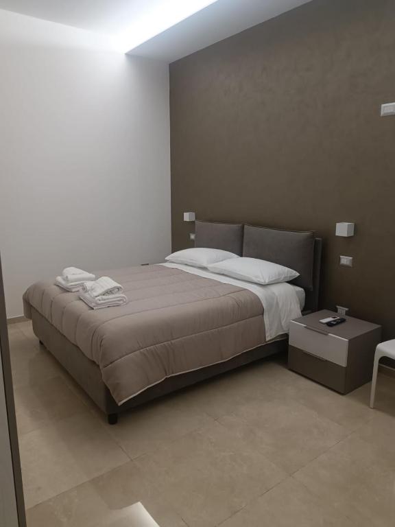 Postel nebo postele na pokoji v ubytování Villa Matilde Monteroni
