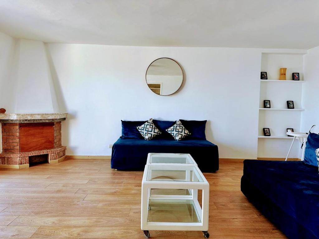 Posezení v ubytování Villa vue imprenable sur l’Océan.