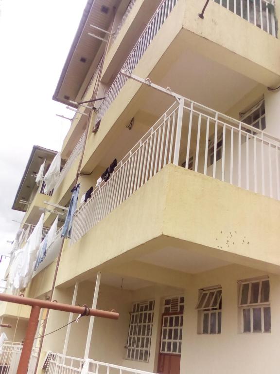 an external view of a building with a balcony at Top tier A 01 in Nakuru