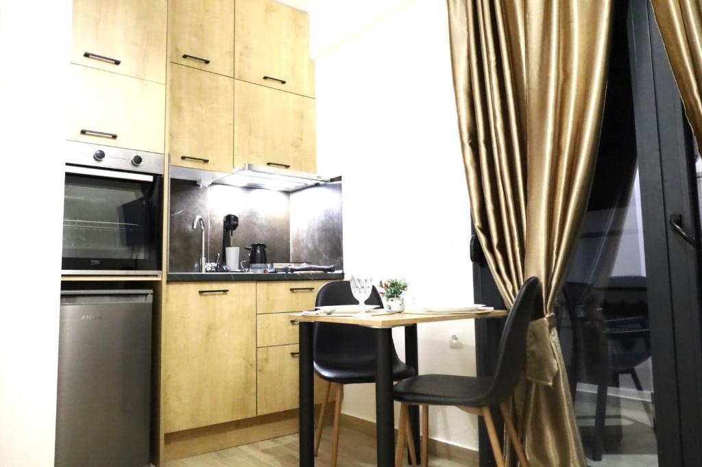Kuchyň nebo kuchyňský kout v ubytování xanthi BnB1
