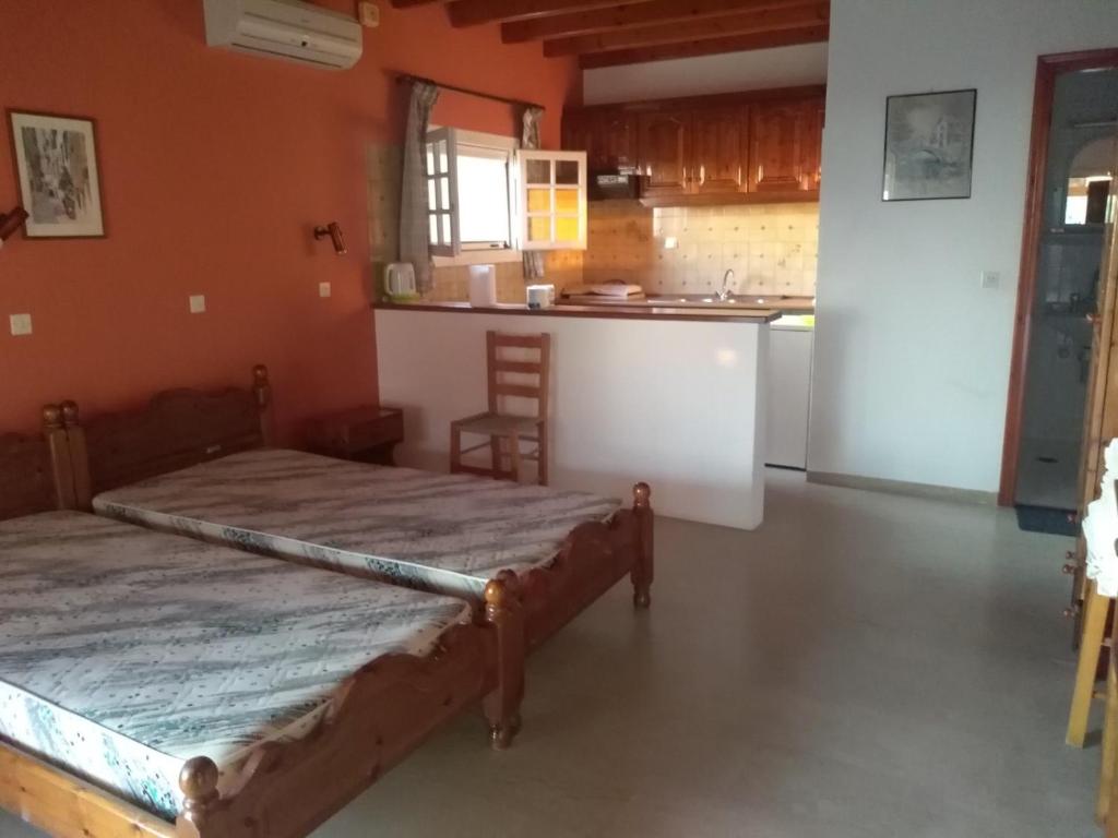 Ένα ή περισσότερα κρεβάτια σε δωμάτιο στο Beach Front Studio Maria