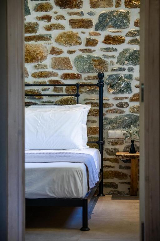 A bed or beds in a room at RODON Luxury Villas