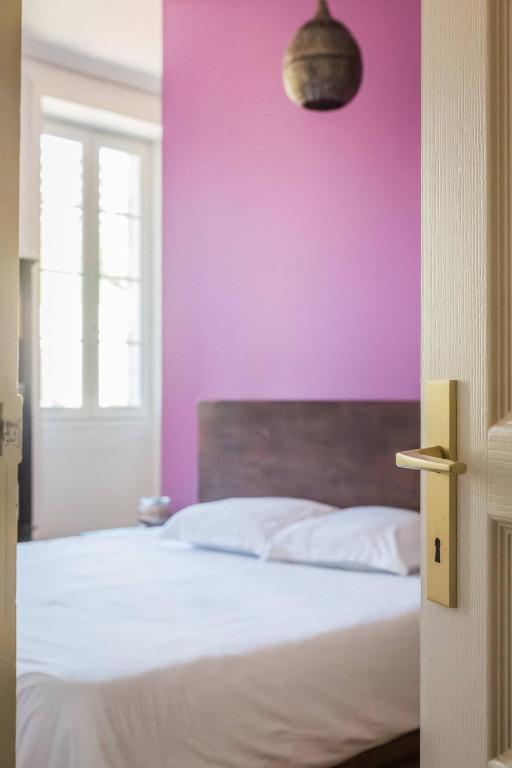 Ein Bett oder Betten in einem Zimmer der Unterkunft Maison cozy - 3 chambres - Tulle