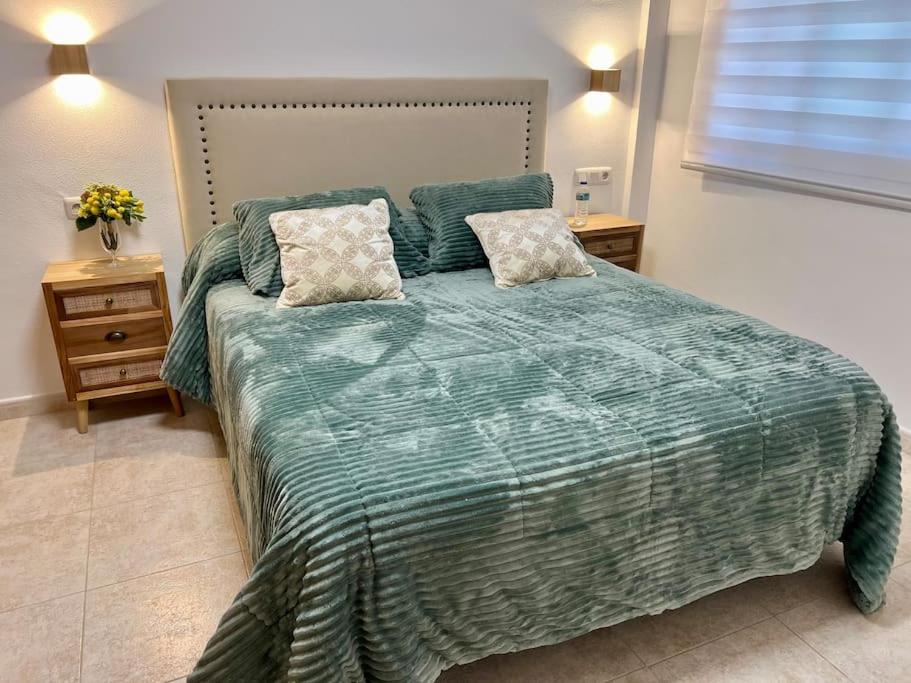 Postel nebo postele na pokoji v ubytování Piso en el corazón de Águilas