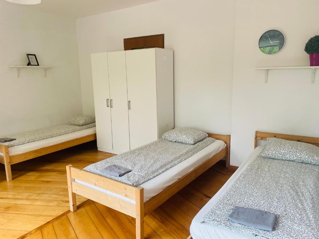 Posteľ alebo postele v izbe v ubytovaní Pokoje Slawin