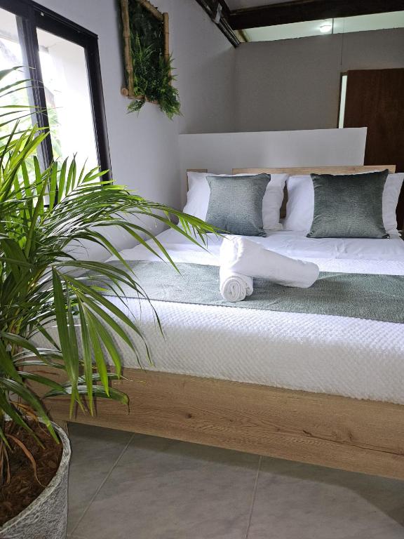 Postel nebo postele na pokoji v ubytování Eden Hotel