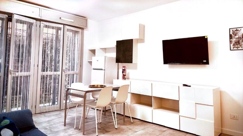 TV a/nebo společenská místnost v ubytování Maison Du Pic - Rho Fiera