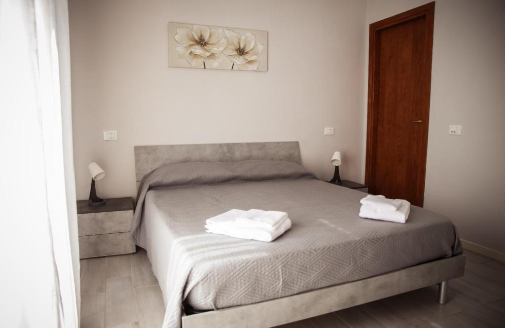 Ένα ή περισσότερα κρεβάτια σε δωμάτιο στο HOUSE DREAMS TOSCANY