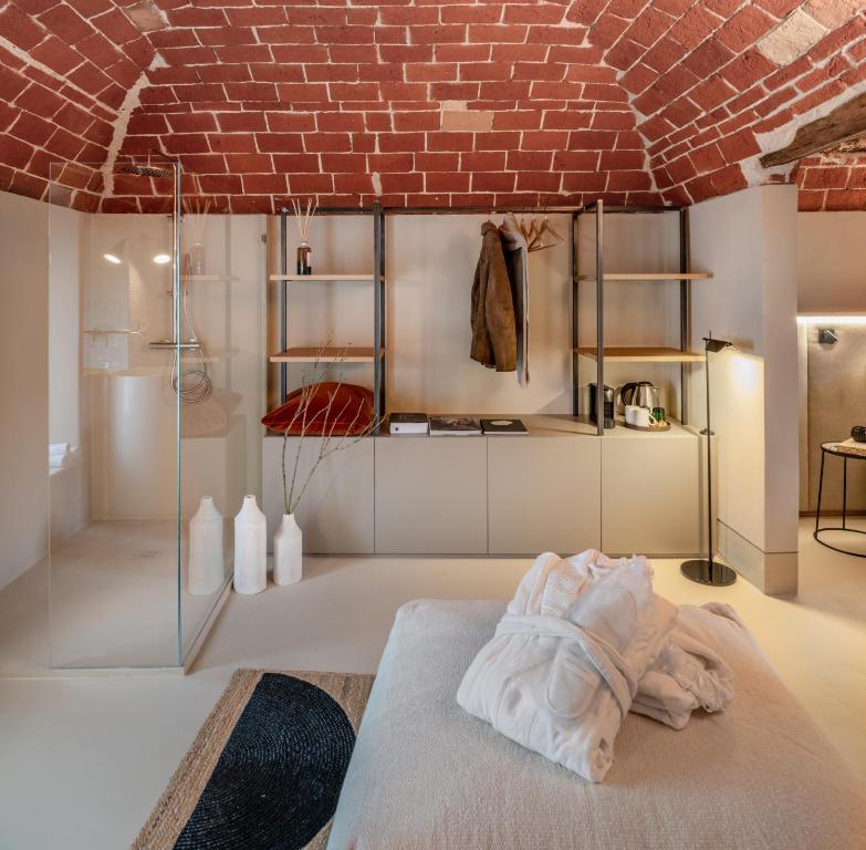 Postel nebo postele na pokoji v ubytování Relais Dal Cavaliere