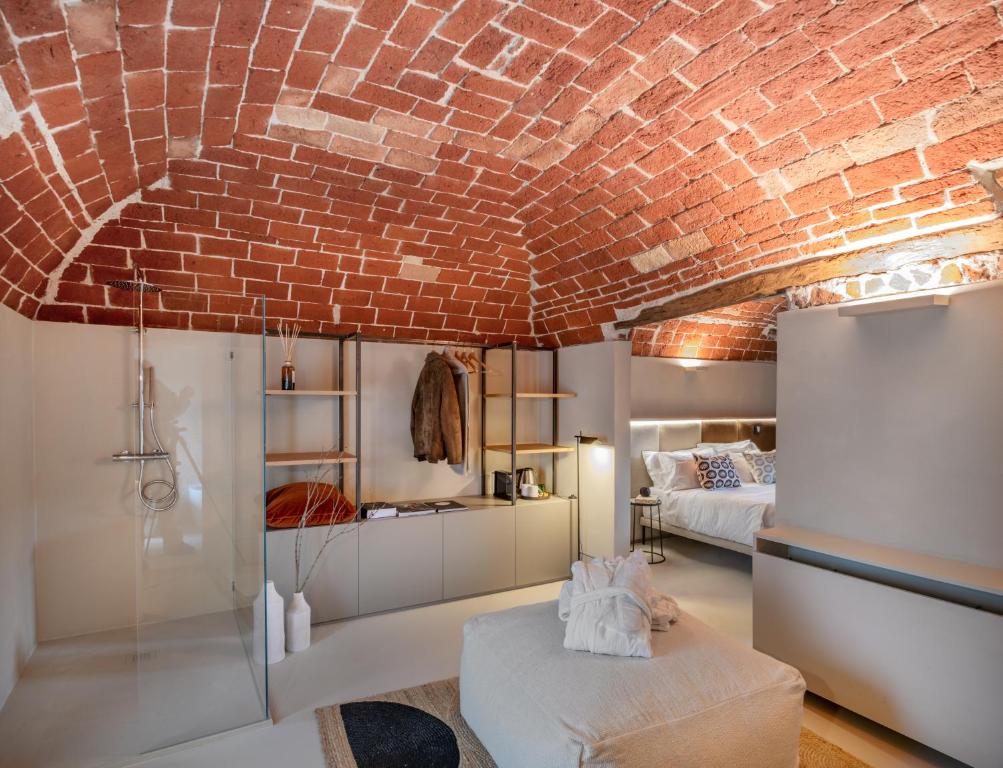 Postel nebo postele na pokoji v ubytování Relais Dal Cavaliere