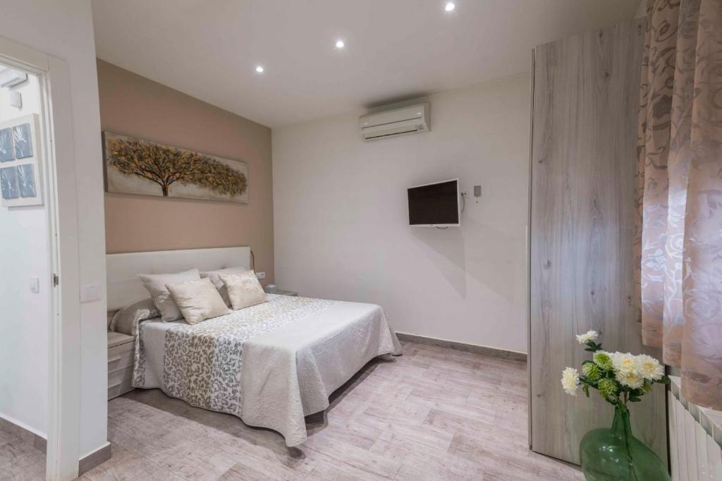 Un pat sau paturi într-o cameră la Almagrocasarural