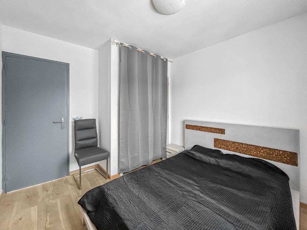 Letto o letti in una camera di Escapade à Lodève la Paisible