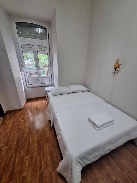 Ένα ή περισσότερα κρεβάτια σε δωμάτιο στο Residencial Ideal