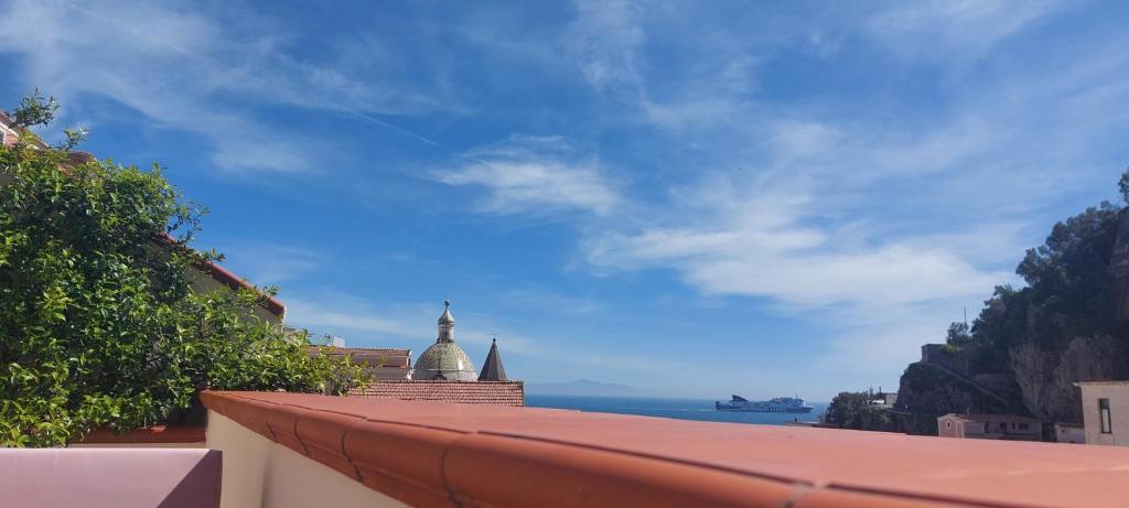 a view of the ocean from the roof of a building at B&B Domus San Pietro in Cetara