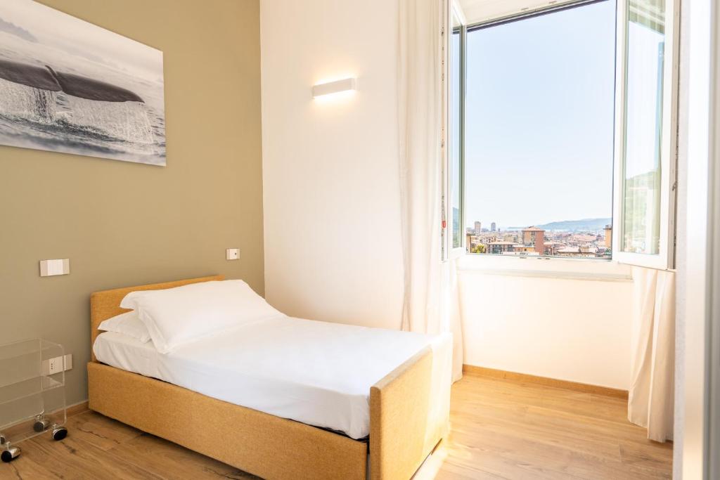 Postel nebo postele na pokoji v ubytování Le camere sui colli 2