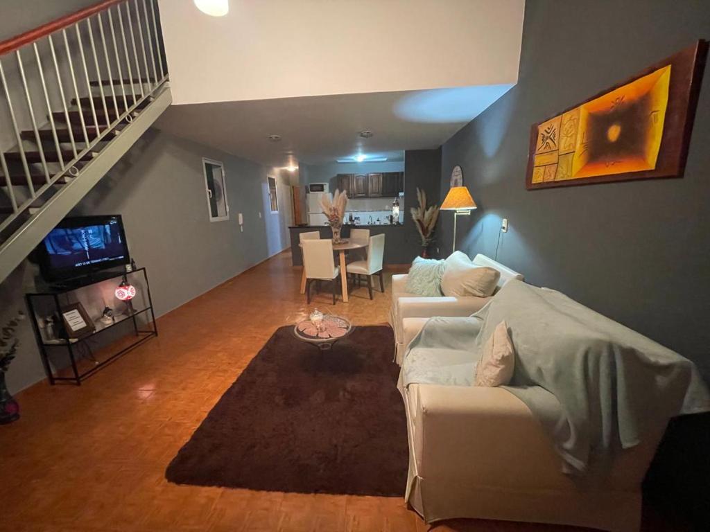 Et tv og/eller underholdning på Departamentos PRANA C con COCHERA