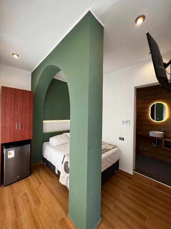 Postel nebo postele na pokoji v ubytování Gamora Hotel Playa