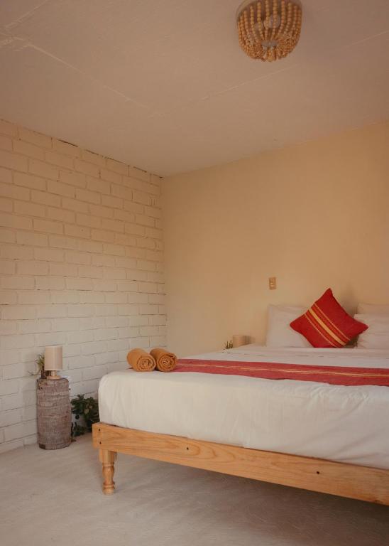 Postel nebo postele na pokoji v ubytování Hapiness Bungalows