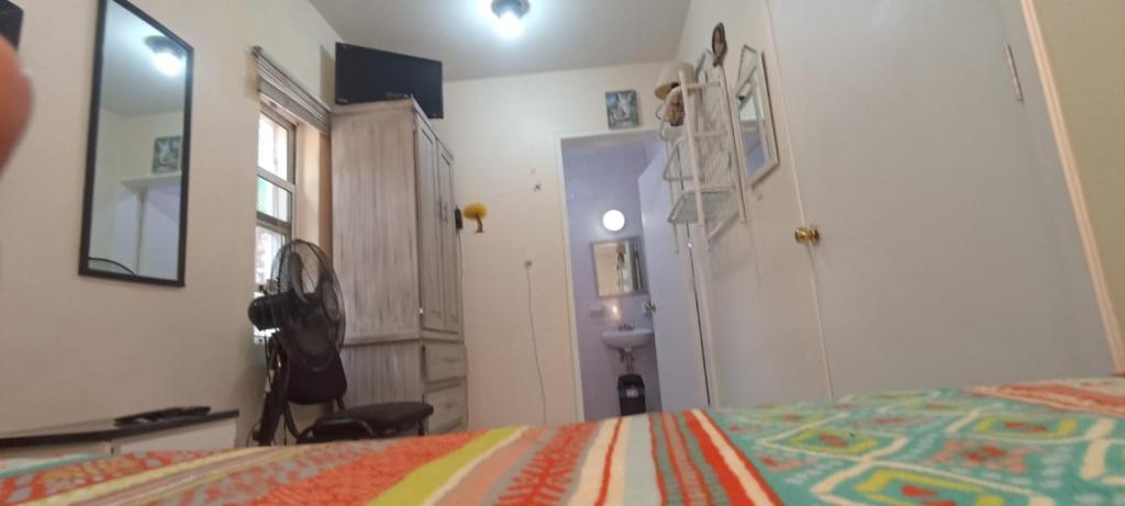 Postel nebo postele na pokoji v ubytování Hotel Teui Formarte