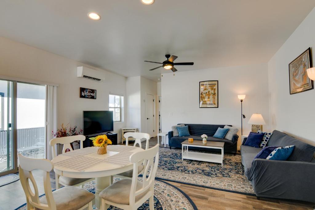 a living room with a table and a couch at Lakefront Pagosa Springs Escape Near Hiking Trails in Pagosa Springs