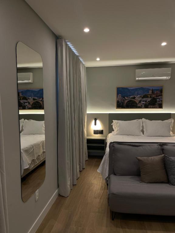 Iguatemi Stay B - PREMIUM location, MODERN and NEW space, Affordableにあるベッド