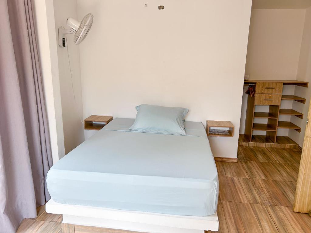 Postel nebo postele na pokoji v ubytování HOTEL EBENEZER