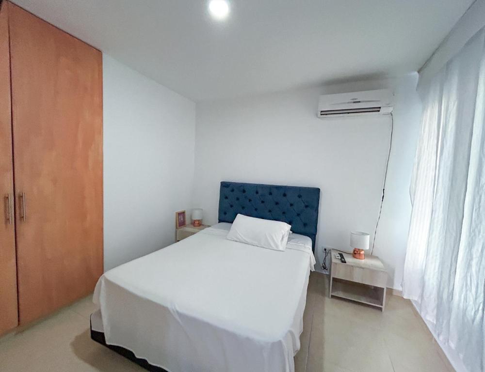 Postel nebo postele na pokoji v ubytování HOTEL EBENEZER