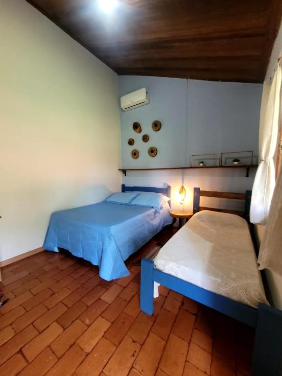 Postel nebo postele na pokoji v ubytování Pousada Fazenda São Pedro