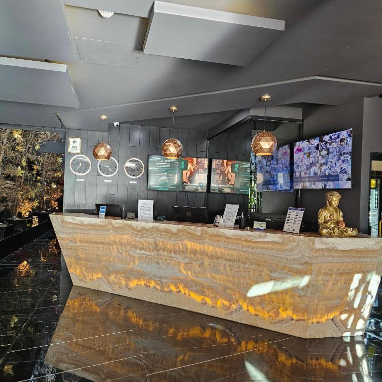 TV a/nebo společenská místnost v ubytování HOTEL RIO RITA