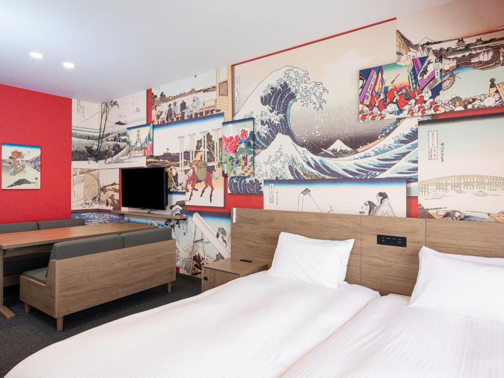 Postel nebo postele na pokoji v ubytování MIMARU Tokyo Kinshicho